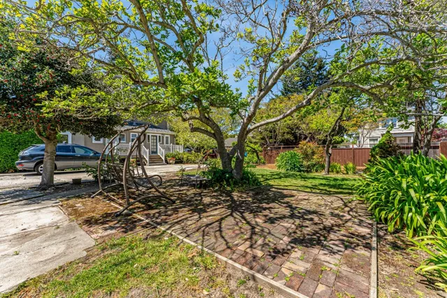 a view of a bench in a backyard