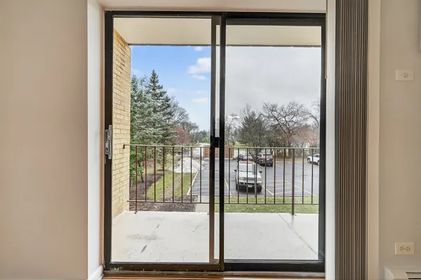 a view of a room with a large window