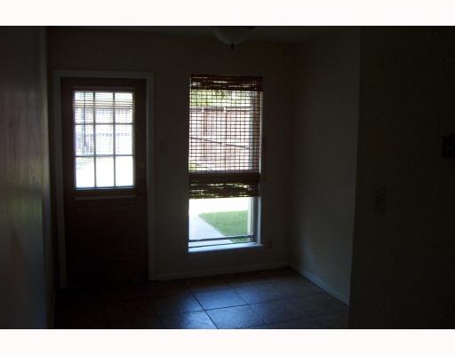 4820 Delwood Street, Unit C6 Corpus Christi, TX 78413 - Photo 8 of 10 a view of an empty room with a window