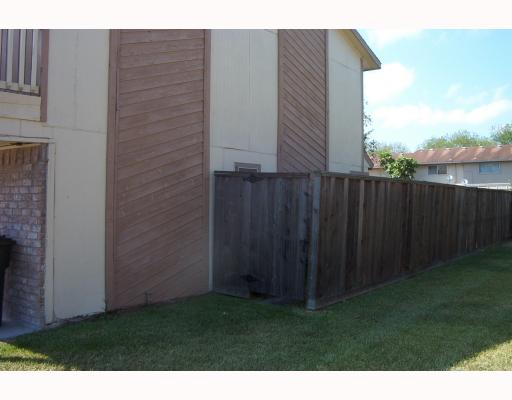 4820 Delwood Street, Unit C6 Corpus Christi, TX 78413 - Photo 10 of 10 a view of backyard with pathway
