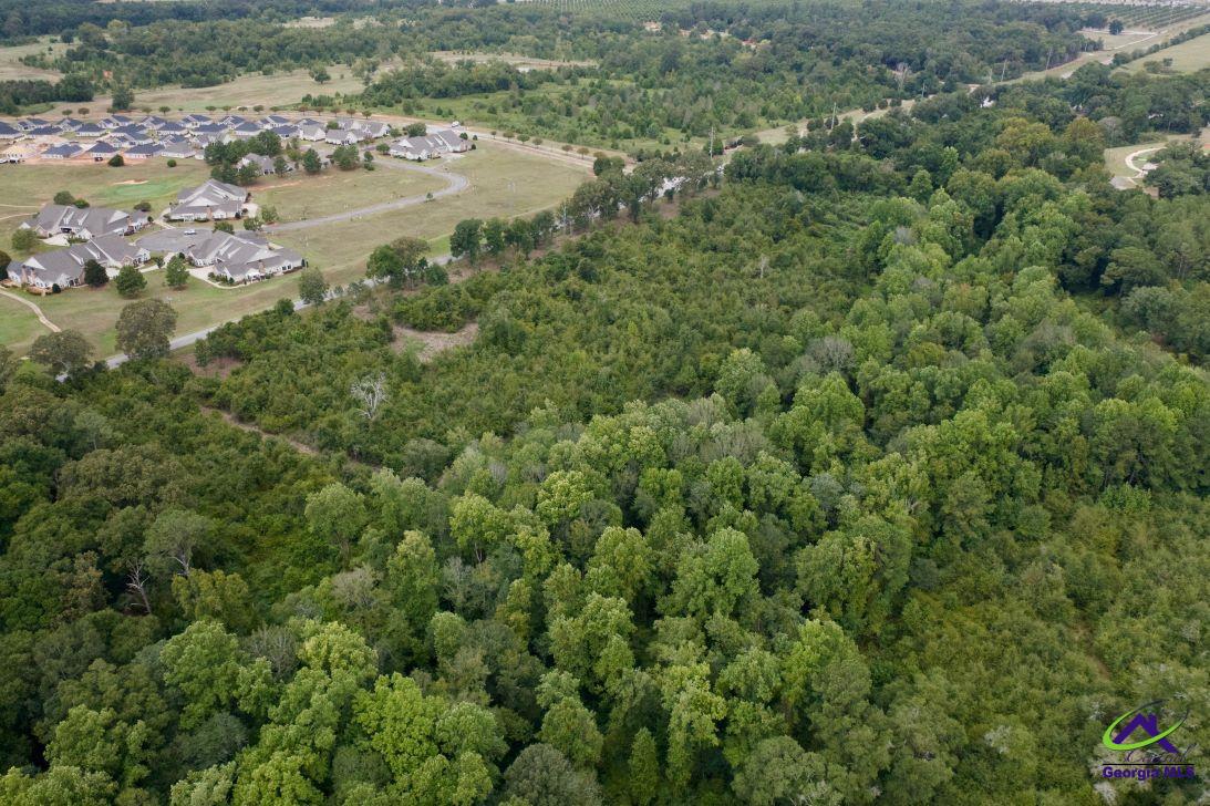 Airport Road Perry, GA 31069 - Photo 16 of 23 an aerial view of residential houses with outdoor space and trees
