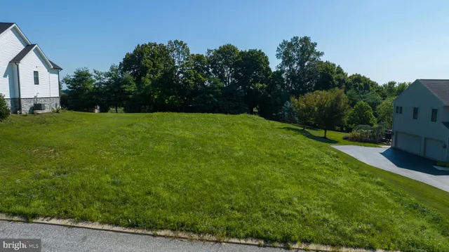 a view of a lake with a city
