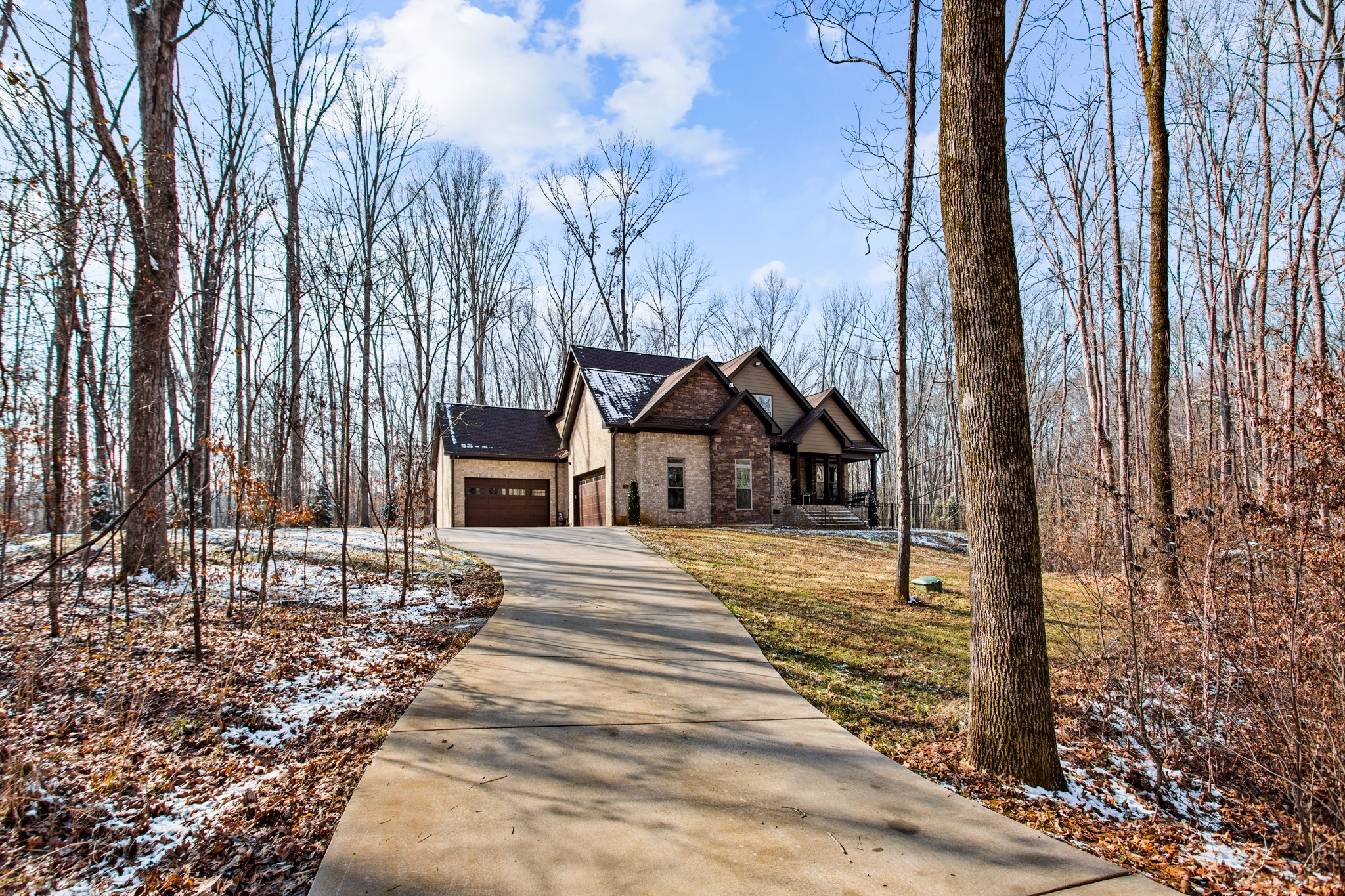 425 Puckett Road Murfreesboro, TN 37128 - Photo 2 of 44 a house with trees in front of it