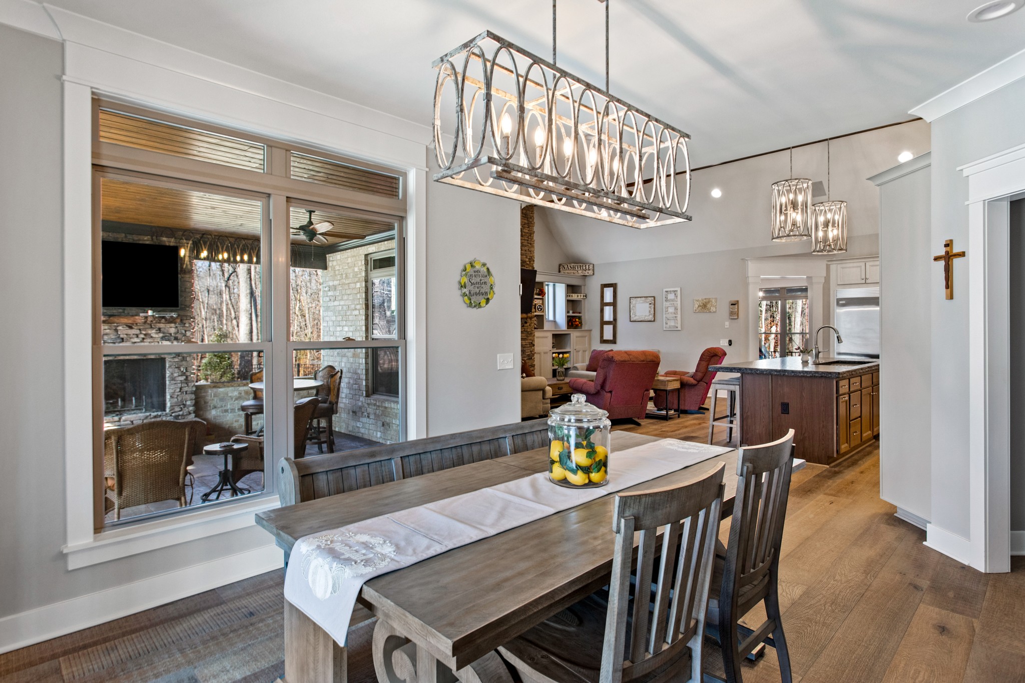 425 Puckett Road Murfreesboro, TN 37128 - Photo 15 of 44 a view of a dining room with furniture a chandelier and wooden floor