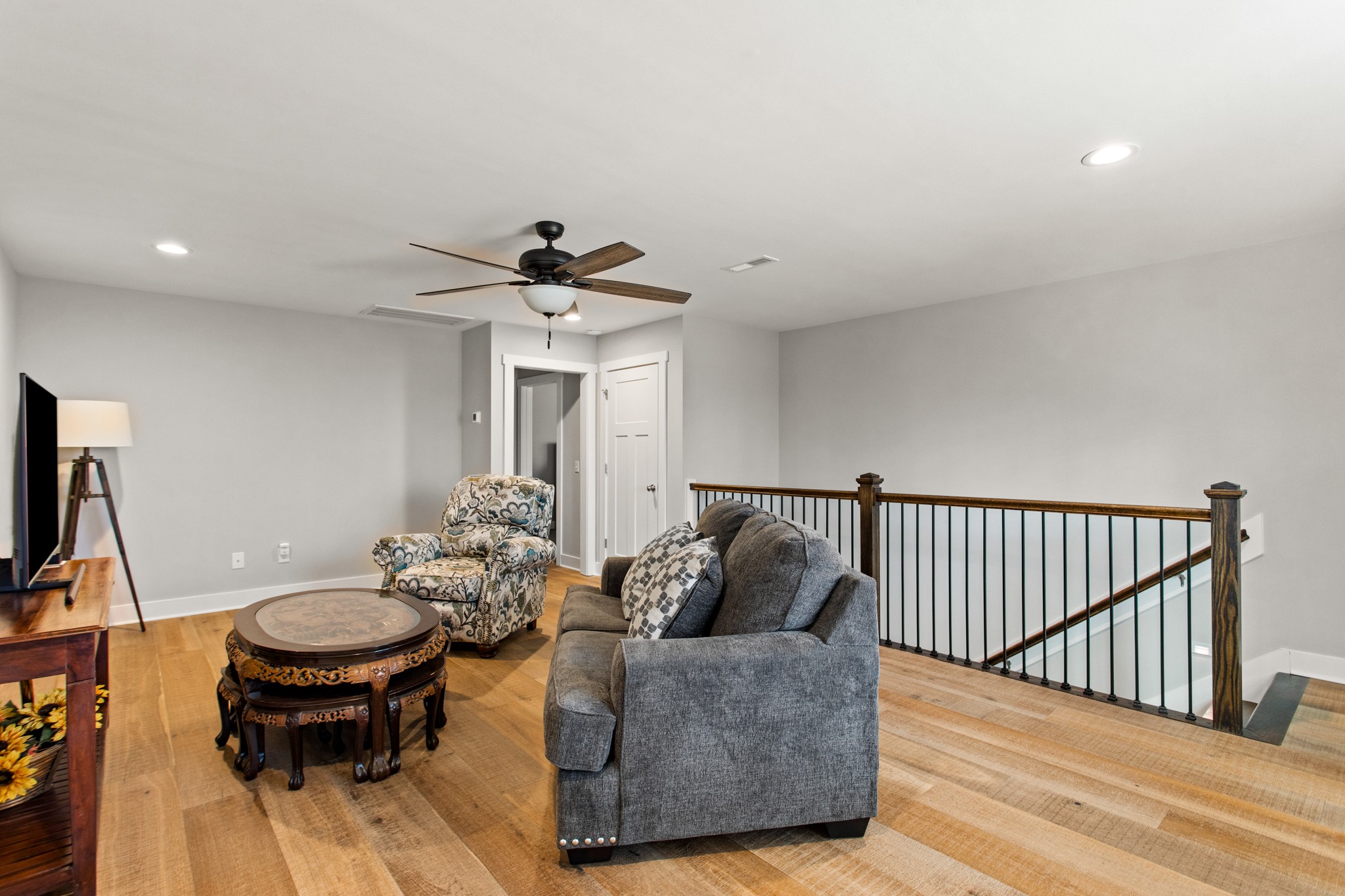 425 Puckett Road Murfreesboro, TN 37128 - Photo 26 of 44 a living room with furniture and a wooden floor