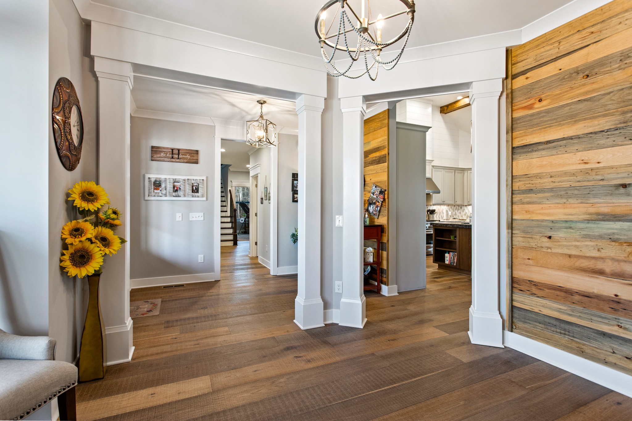 425 Puckett Road Murfreesboro, TN 37128 - Photo 7 of 44 a view of a hallway with wooden floor and entryway