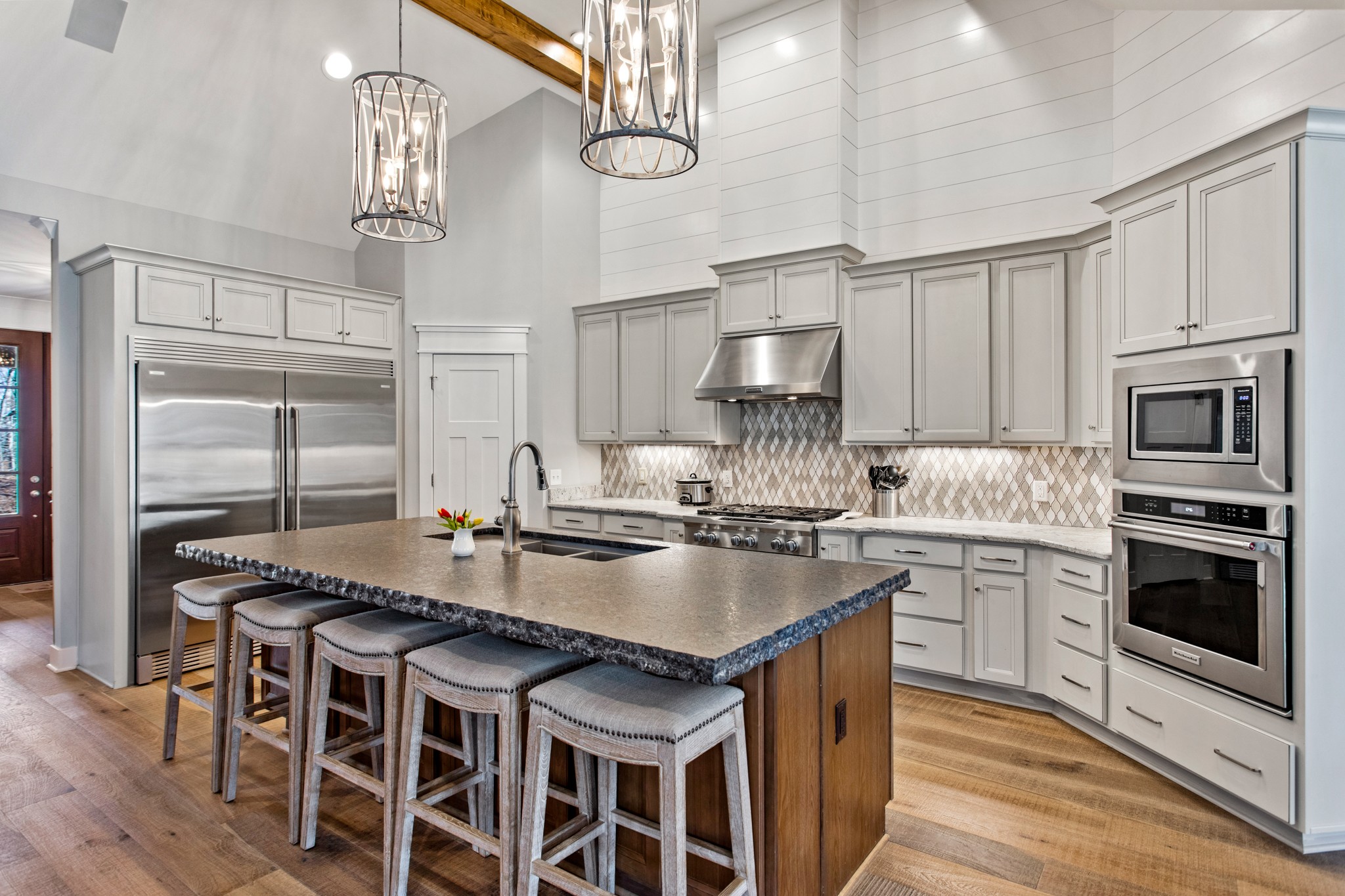 425 Puckett Road Murfreesboro, TN 37128 - Photo 10 of 44 a kitchen with stainless steel appliances granite countertop a stove a sink and a refrigerator
