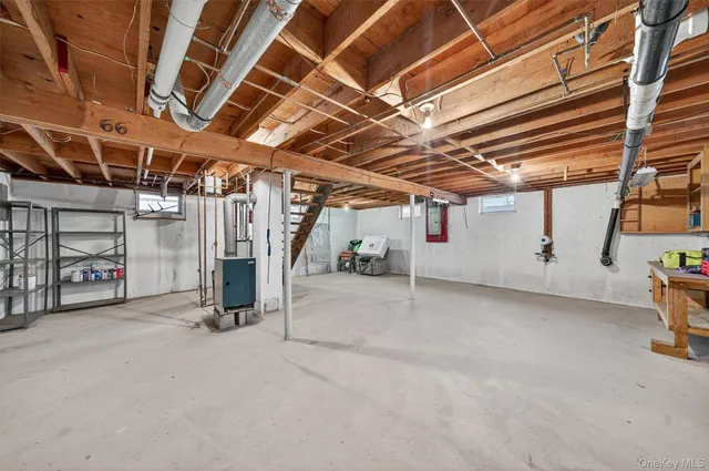 a view of empty room with wooden ceiling