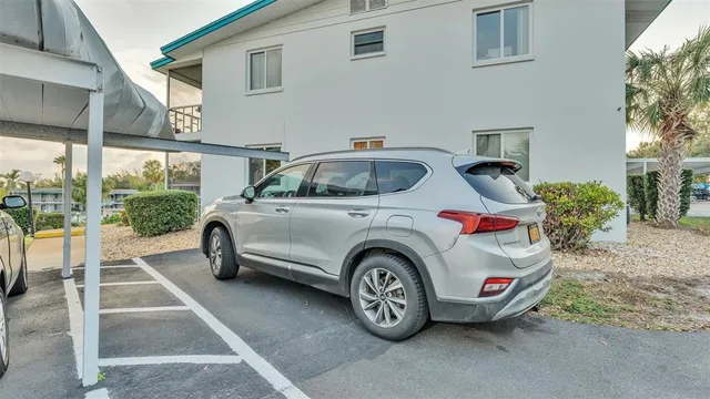 a car parked in front of a building