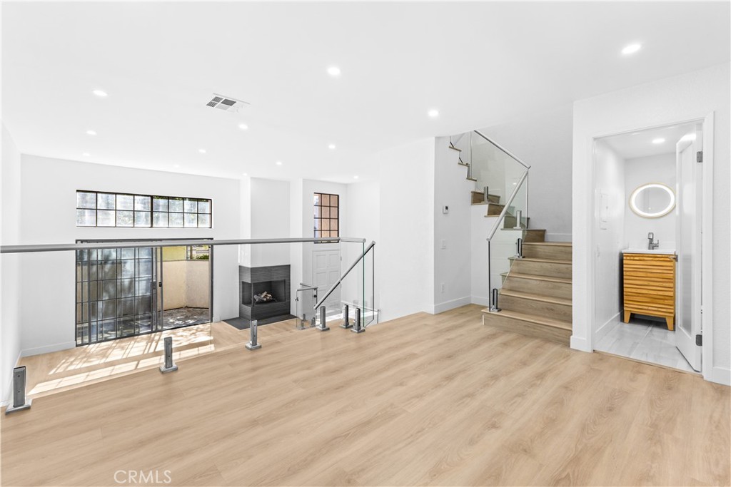 10 Sunshine, Unit 31 Irvine, CA 92603 - Photo 1 of 29 a view of a livingroom with a fireplace