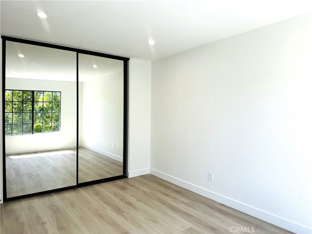10 Sunshine, Unit 31 Irvine, CA 92603 - Photo 14 of 29 a view of an empty room with glass door