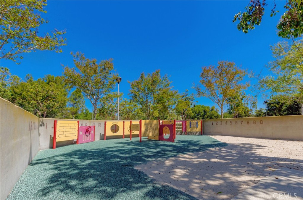 10 Sunshine, Unit 31 Irvine, CA 92603 - Photo 19 of 29 a view of sign board with flower around