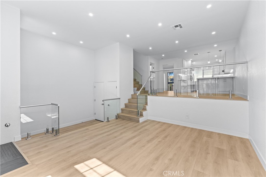 10 Sunshine, Unit 31 Irvine, CA 92603 - Photo 2 of 29 a view of a kitchen with large windows