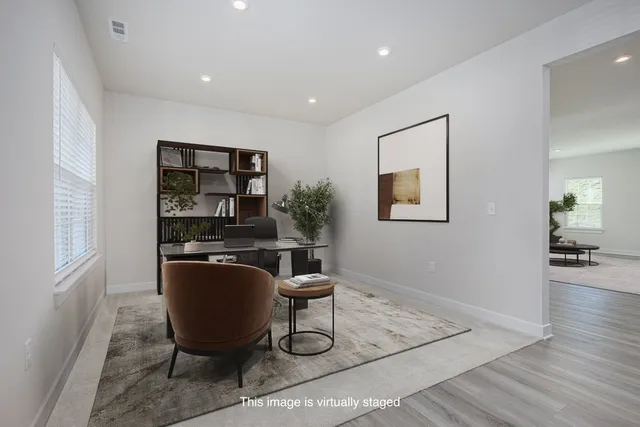 a workspace with furniture and window