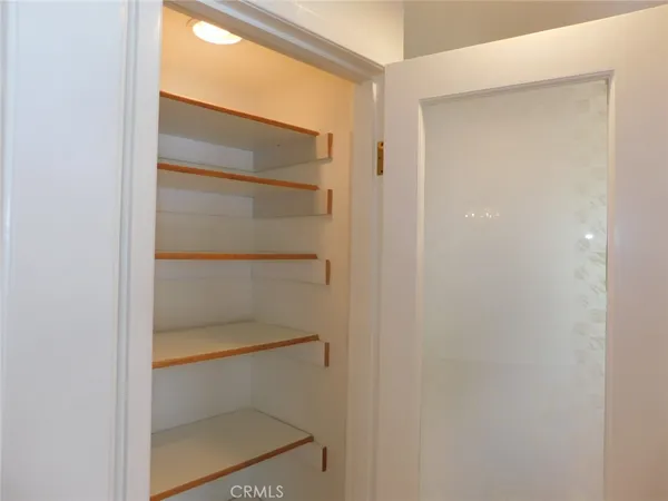 a kitchen with a stove and a microwave