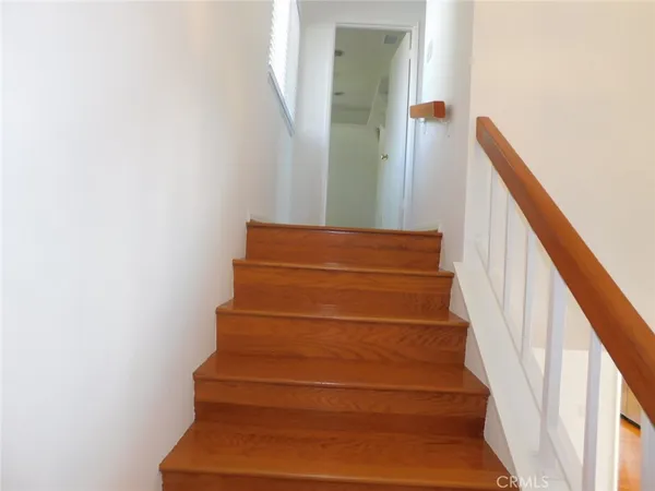 a view of a kitchen from the hallway