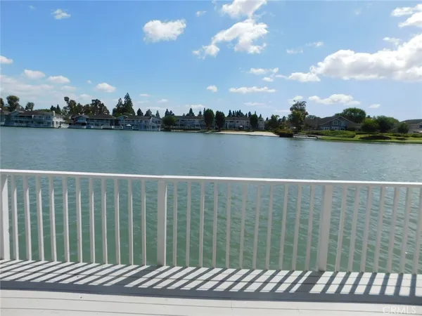 a view of a lake from a balcony