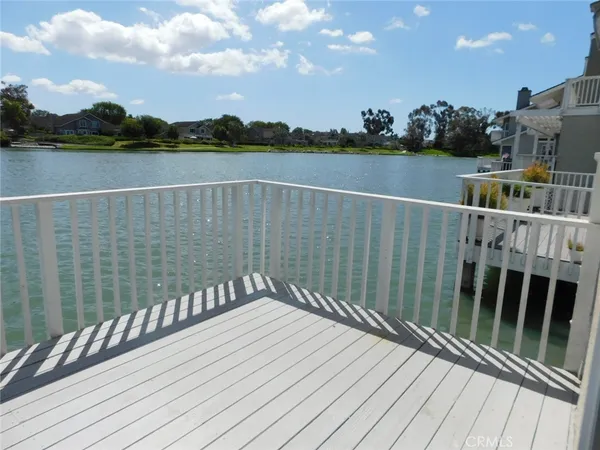 a view of a house with a tree