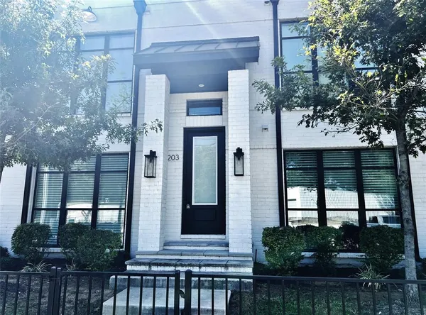 a view of a house with a garden