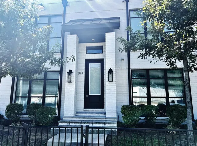 a view of a house with a garden