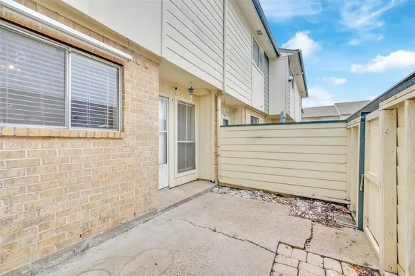 a view of a house with a large window