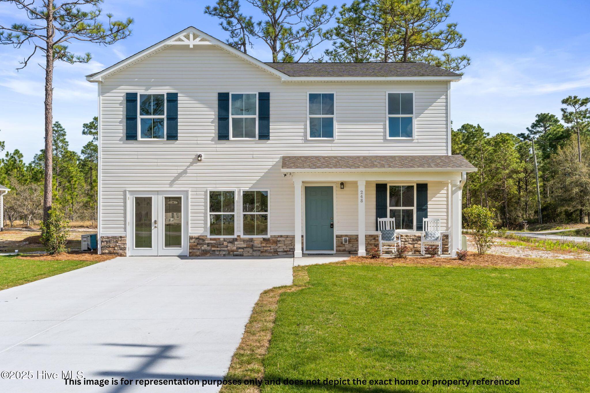 1045 Goldsboro Road Boiling Spring Lakes, NC 28461 - Photo 1 of 15 The Clover