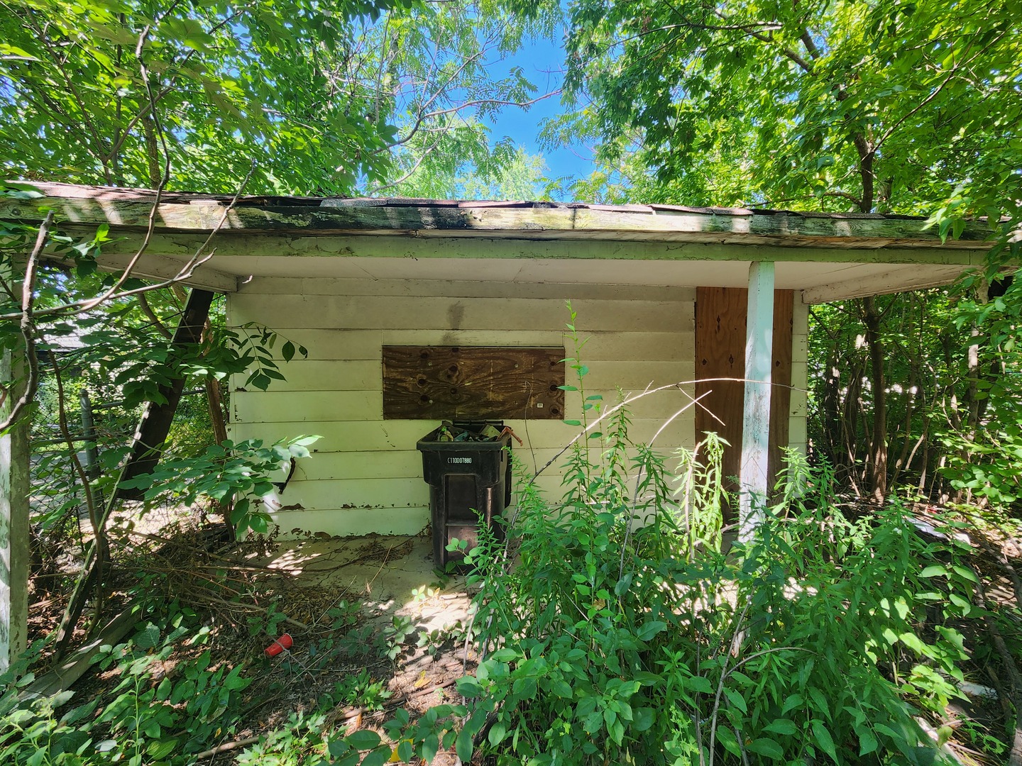 106 West 114th Street Chicago, IL 60628 - Photo 3 of 14 front view of a house with a yard