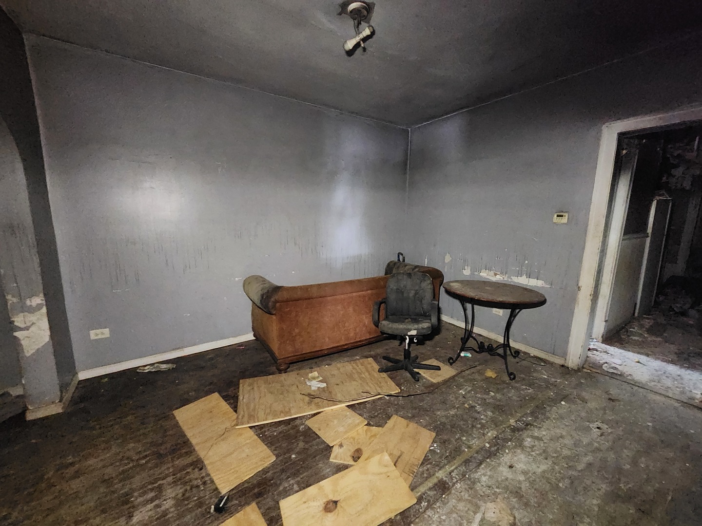 106 West 114th Street Chicago, IL 60628 - Photo 4 of 14 a living room with furniture