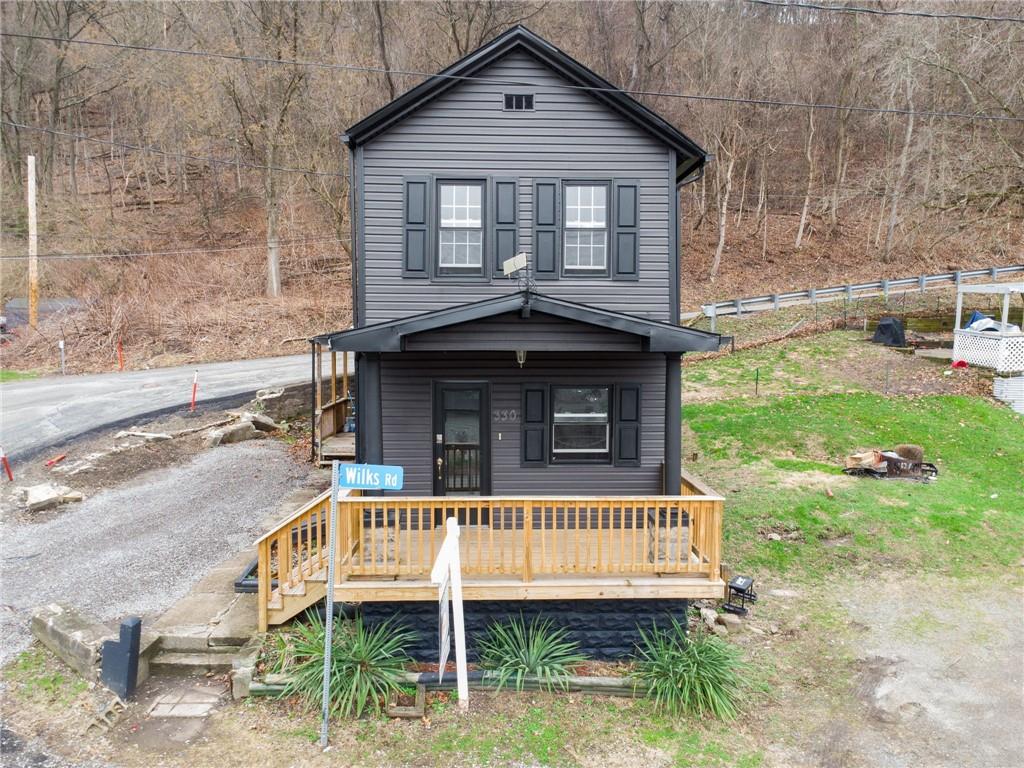 330 Braeburn Road Lower Burrell, PA 15068 - Photo 2 of 31 a front view of a house with garden