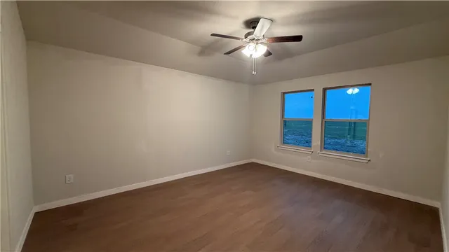 a bathroom with a tub a toilet and a sink