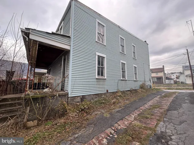 a view of a house with a patio