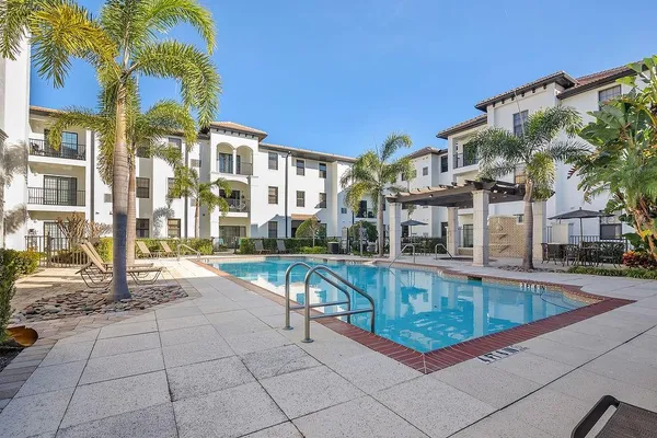 a view of a house with swimming pool
