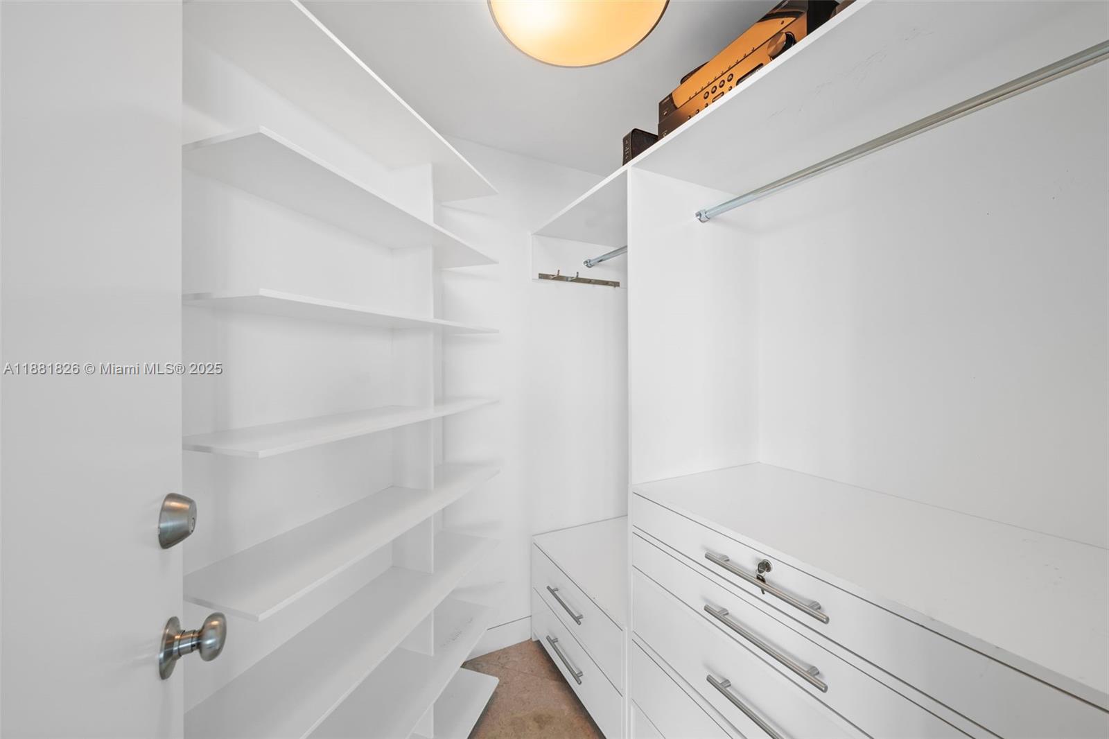 1643 Brickell Avenue, Unit 4102 Miami, FL 33129 - Photo 36 of 49 Bedroom #3 walk-in closet