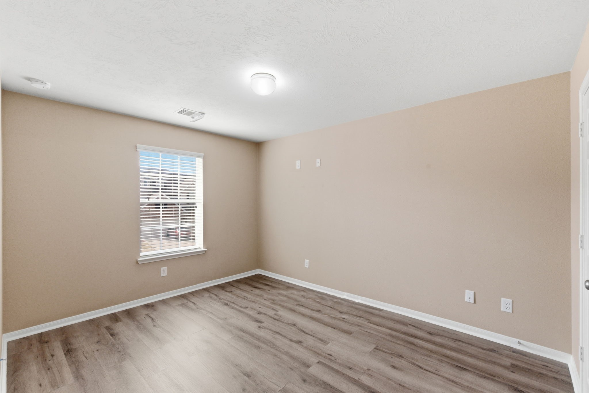 10510 Day Trail Lane Spring, TX 77379 - Photo 11 of 23 The secondary bedrooms are remarkably spacious, clean, and completely carpet-free for easy maintenance.