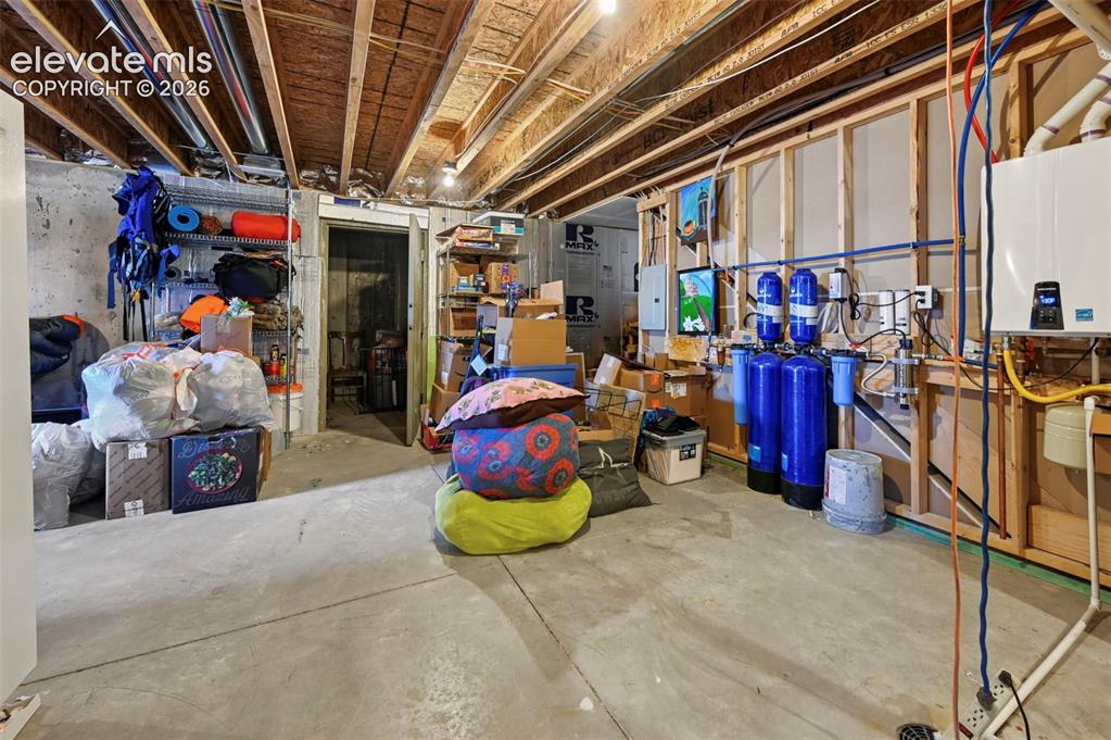 40051 Cold Iron Road Rush, CO 80833 - Photo 38 of 50 Storage room with water filtration system
