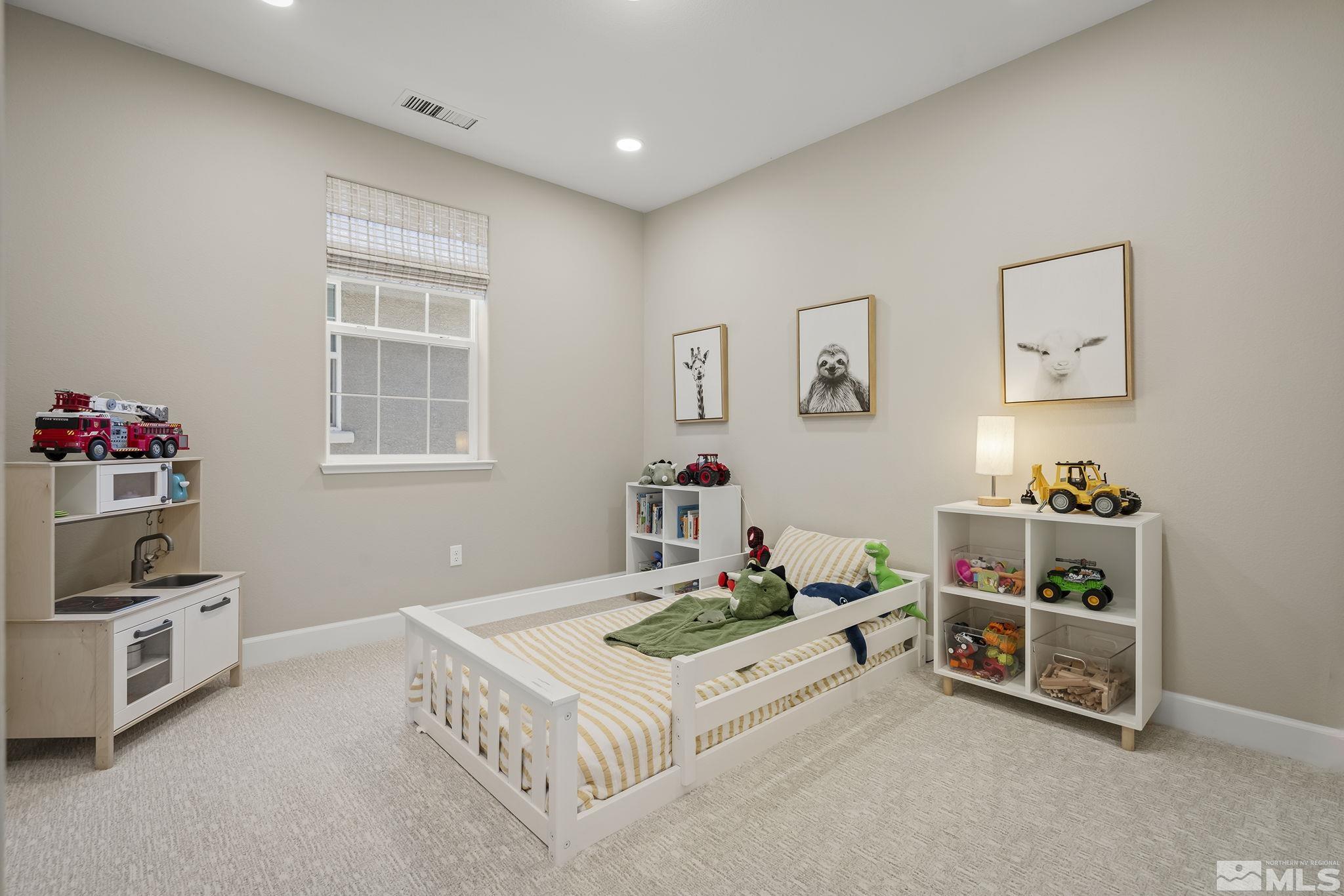 2041 Wind Ranch Road, Unit C Reno, NV 89521 - Photo 20 of 27 a room with furniture and a window