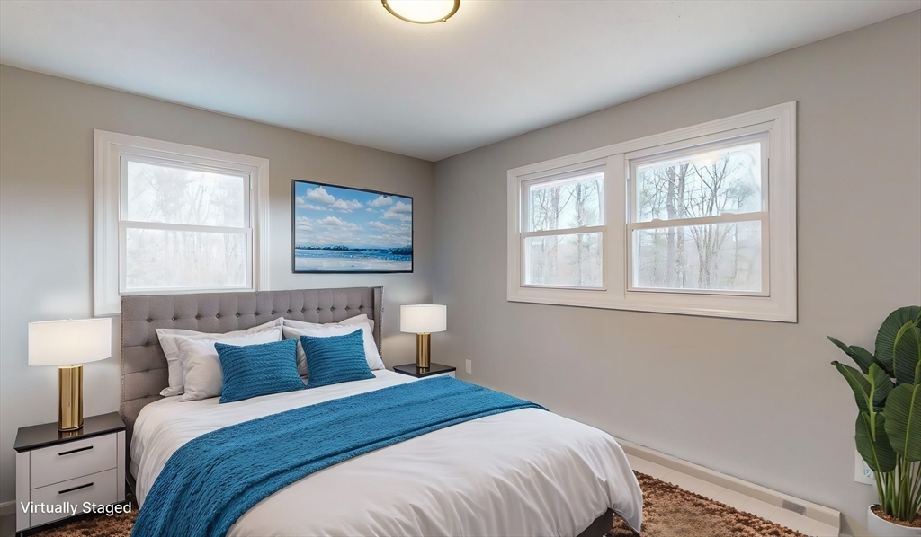 564 West Pelham Road Shutesbury, MA 01072 - Photo 25 of 40 a bedroom with bed and a window