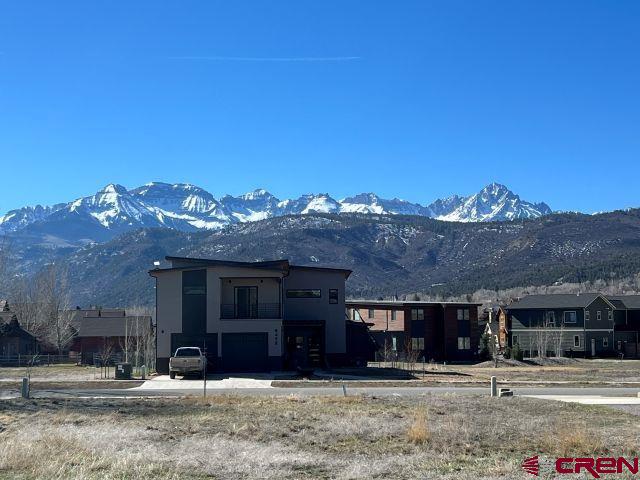 Tbd Marion Overlook Overlook, Unit OVERLOOK Ridgway, CO 81432 - Photo 6 of 10 a front view of a house with a yard