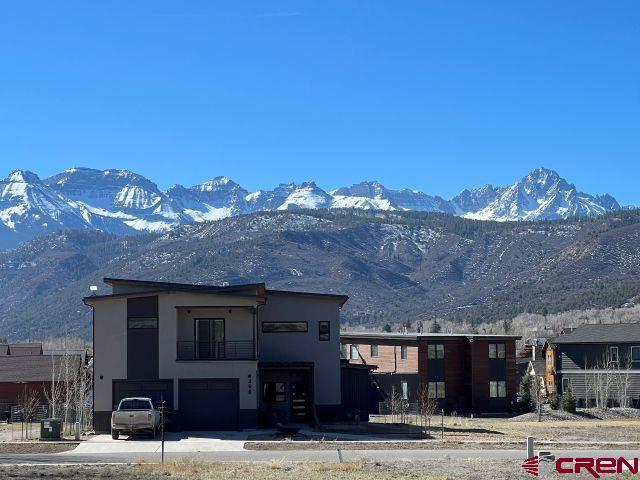Tbd Marion Overlook Overlook, Unit OVERLOOK Ridgway, CO 81432 - Photo 8 of 10 a view of a house with a yard and a large window