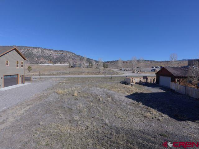Tbd Marion Overlook Overlook, Unit OVERLOOK Ridgway, CO 81432 - Photo 9 of 10 a view of a house with a yard