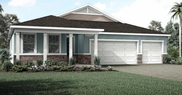 front view of a house with a garden