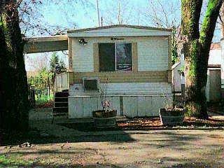 9531 Raintree Street Windsor, CA 95492 - Photo 1 of 1 a view of a house with a yard and sitting area