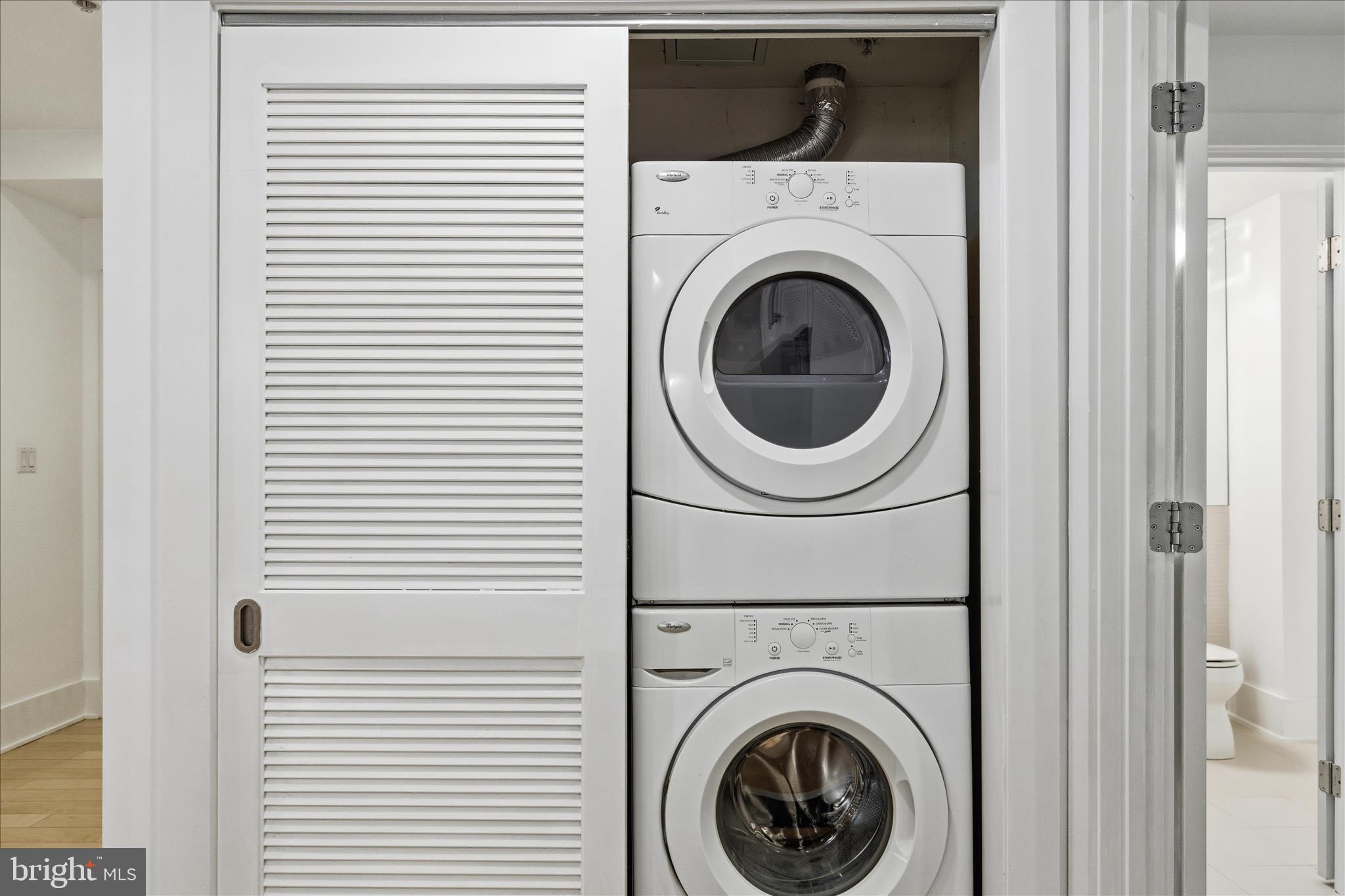 2818 Connecticut Avenue Northwest, Unit 5 Washington, DC 20008 - Photo 25 of 26 a utility room with dryer and washer