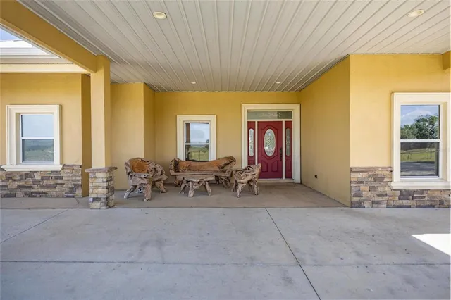 a view of a lobby with furniture and windows