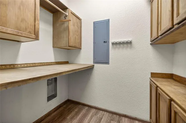 a kitchen with a sink and a refrigerator