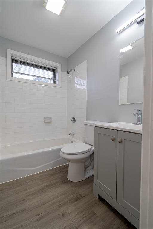 225 South Main Street, Unit 7 Haverhill, MA 01835 - Photo 11 of 27 a bathroom with a sink a toilet and shower