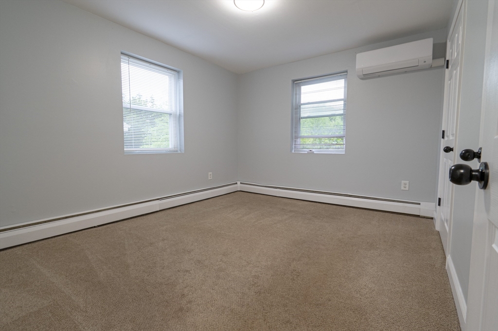 225 South Main Street, Unit 7 Haverhill, MA 01835 - Photo 14 of 27 an empty room with a window