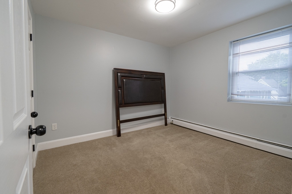 225 South Main Street, Unit 7 Haverhill, MA 01835 - Photo 18 of 27 a view of an empty room with a window