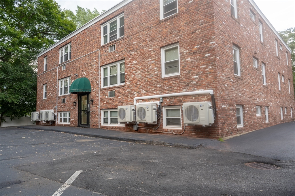 225 South Main Street, Unit 7 Haverhill, MA 01835 - Photo 26 of 27 a front view of a building with barbeque oven