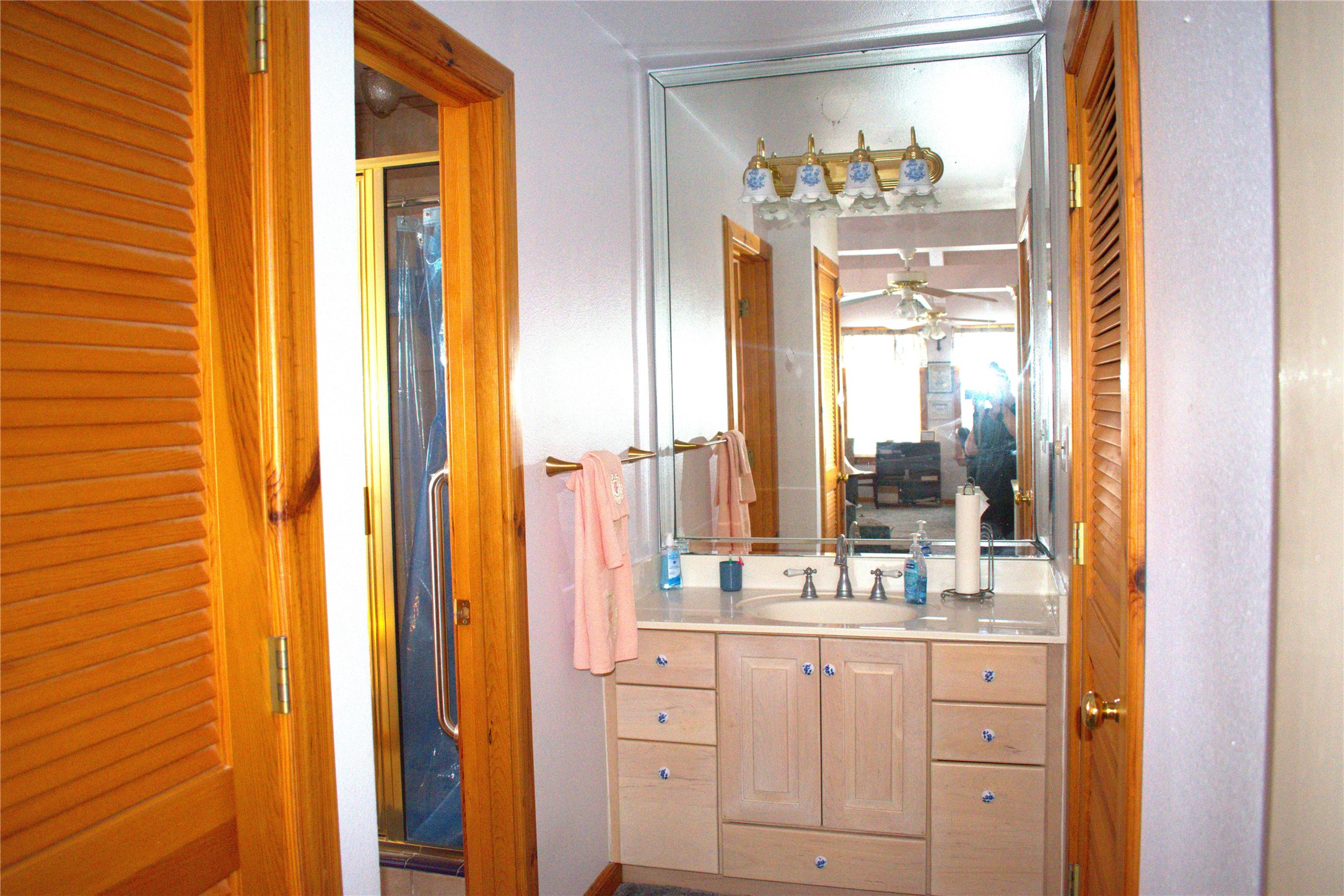 1657 County Road Sargent, TX 77414 - Photo 44 of 46 Large vanity area, lots of storage, oversized shower to the left